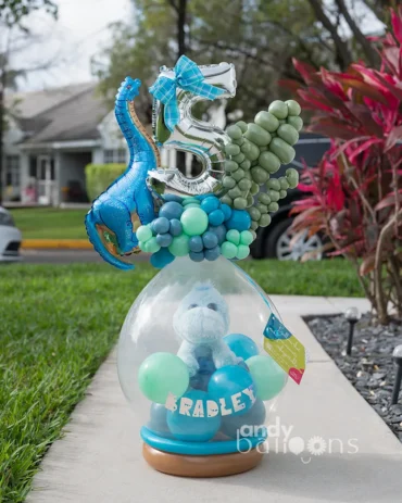 Stuffed balloon featuring a plush dinosaur toy with a dinosaur-themed design, perfect for kids’ birthdays or celebrations