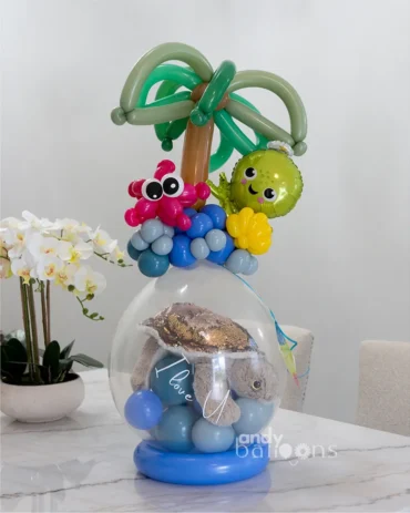 Stuffed balloon with an ocean theme, featuring a plush sea animal inside and decorative balloons for a fun and unique gift