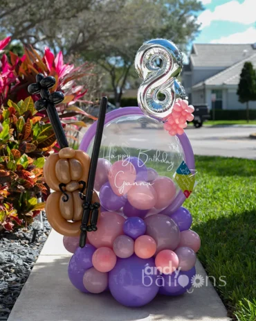 Custom birthday balloon bouquet featuring a handcrafted violin made with balloons, perfect for a violinist or music-themed celebration