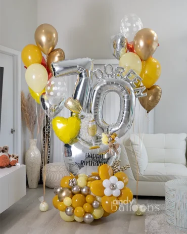 Large personalized birthday balloon setup with custom colors and message, available for delivery in Miami-Dade, Broward, and Palm Beach counties
