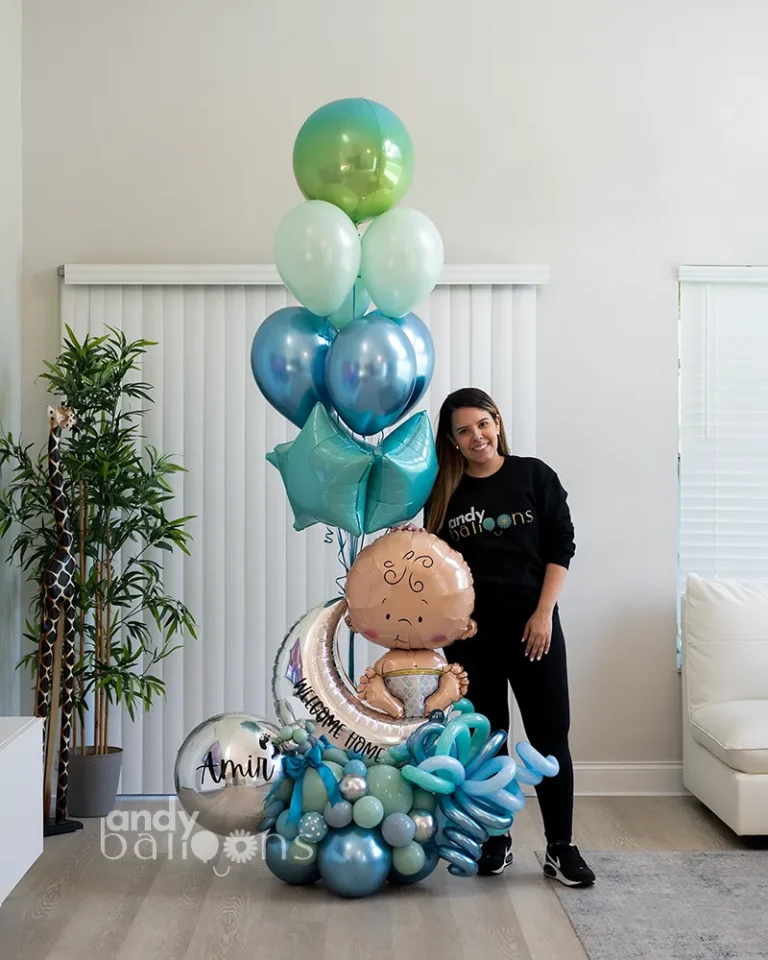 Balloon arrangement to welcome a newborn home, featuring a baby and moon theme with soft, elegant balloon details