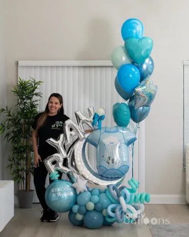 Deluxe baby homecoming balloon gift with personalized baby name design, featuring elegant balloon arrangements to welcome the newborn home