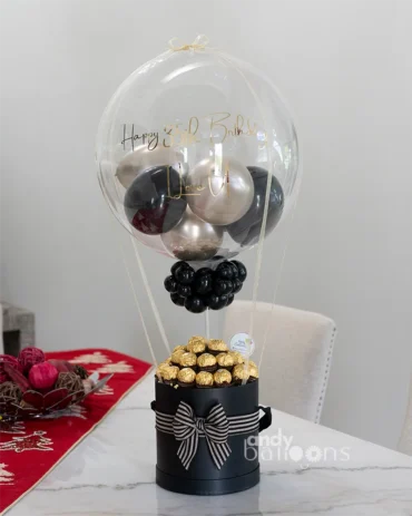 Hot air balloon-style gift arrangement featuring Ferrero Rocher chocolates, perfect for chocolate lovers and special celebrations