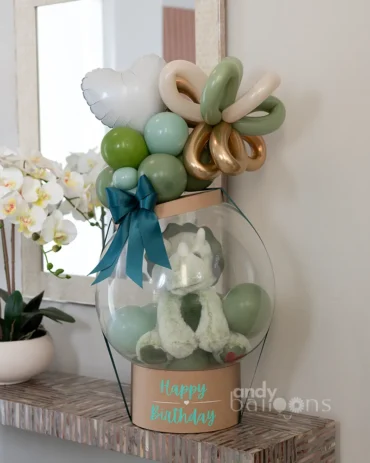 Stuffed balloon surprise box with gifts and colorful decorations inside