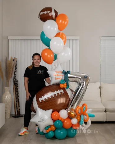 Football-themed balloon bouquet with an American football and age for birthday celebration
