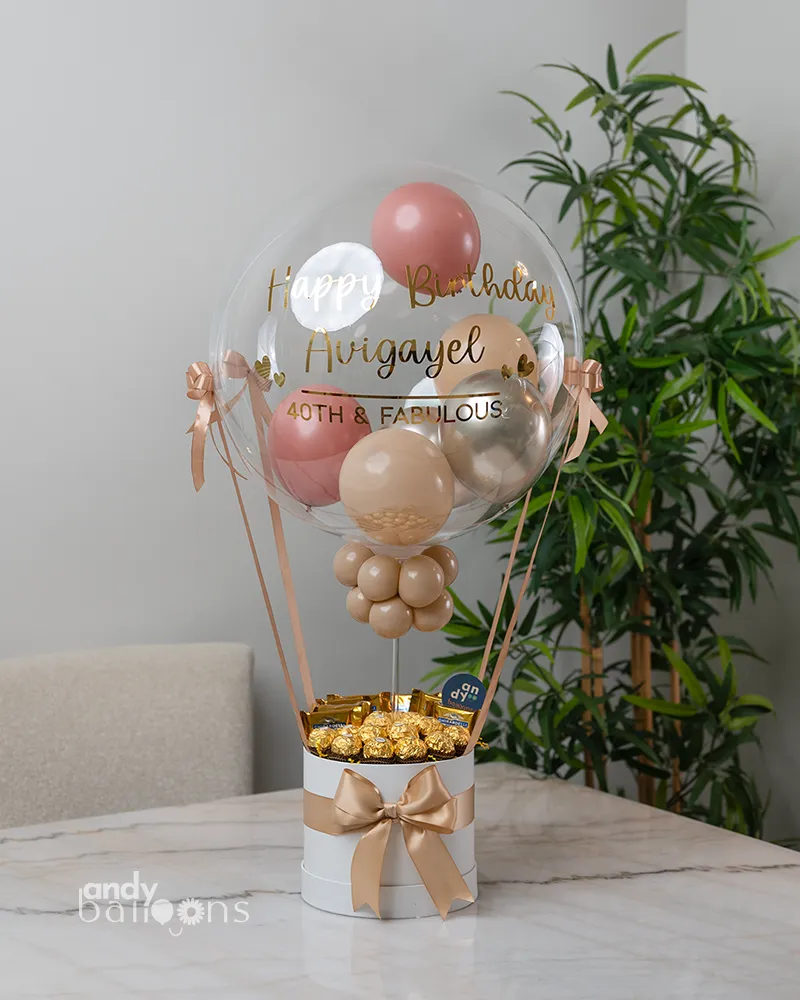 Hot air balloon gift arrangement with Ferrero Rocher and Ghirardelli chocolates
