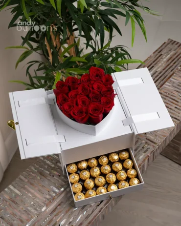 Luxe Heart Secret Box with lid revealing heart-shaped rose arrangement and Ferrero chocolates in a drawer