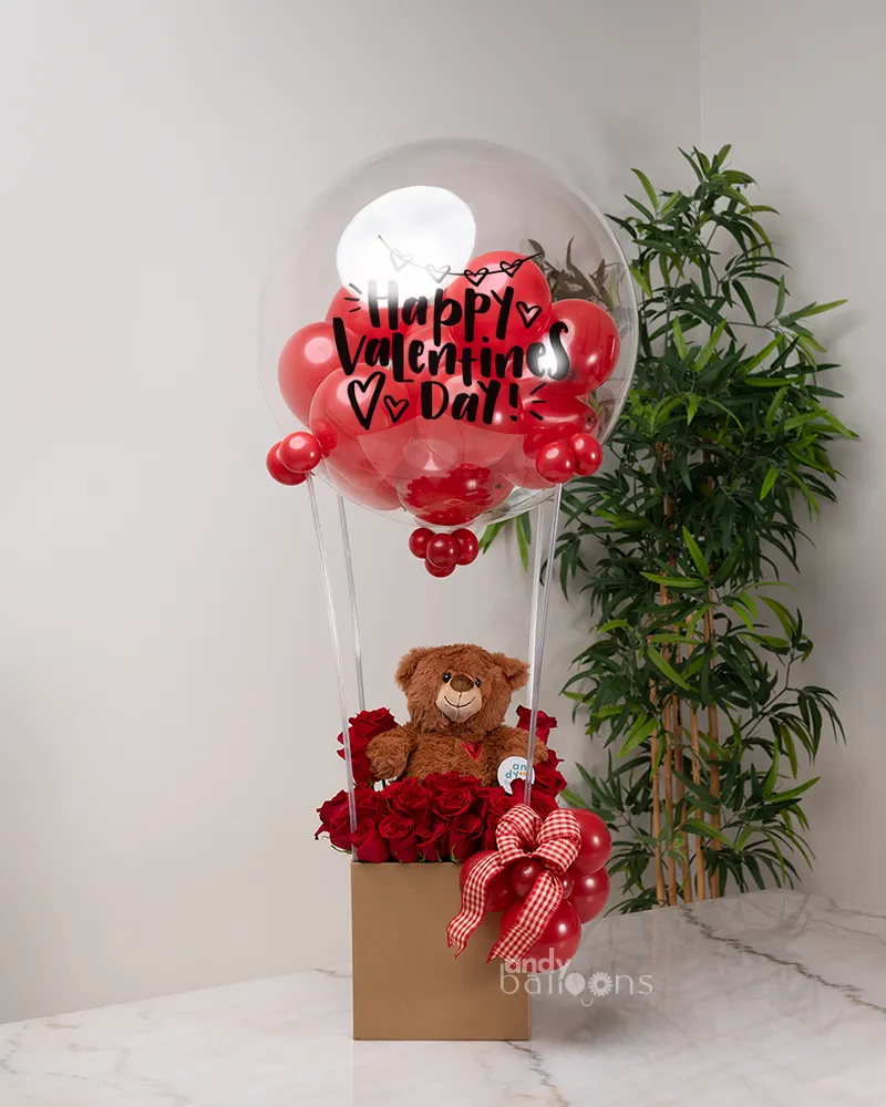 Teddy bear and flowers inside hot air balloon love arrangement