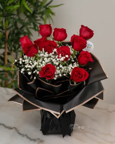 Dozen fresh roses bouquet arranged beautifully for romantic gifting