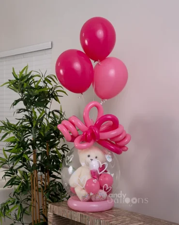 Stuffed balloon with white teddy bear and pink balloons